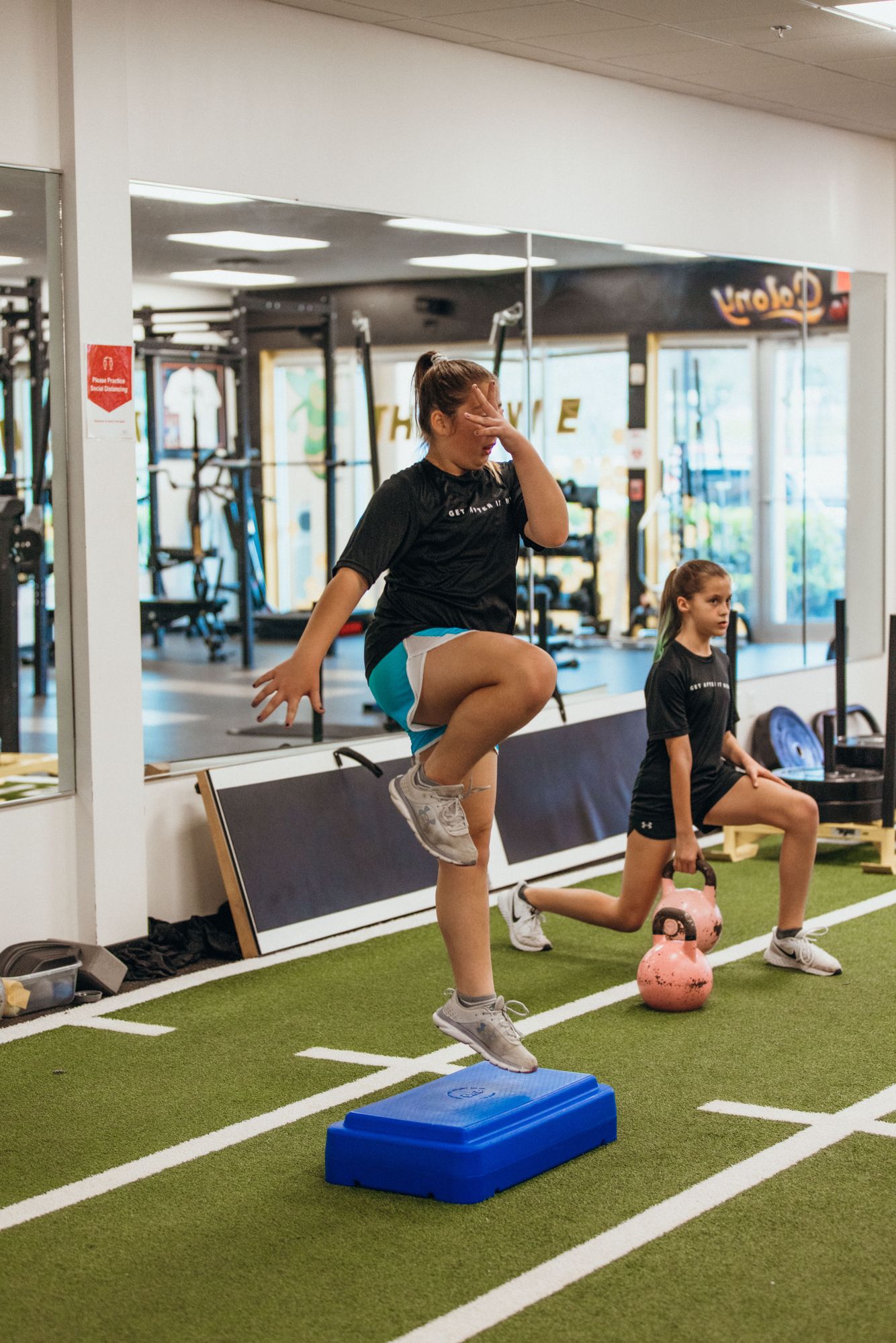 Two GAINS athletes doing step drills