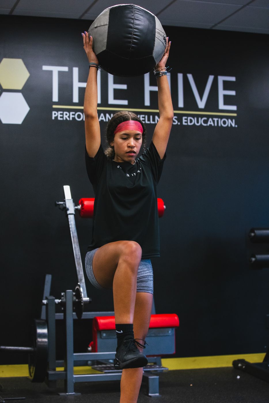 Athlete training with a medicine ball